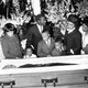 Coretta Scott King, wearing hat and gloves, and her four children view the body of her husband, slain civil rights activist leader Dr. Martin Luther King Jr., in Atlanta, Ga., on April 7, 1968. The children are, from left, Yolanda, 12, Bernice, 5, Martin III, 11, and Dexter 7. Dr. King was assassinated in Memphis, Tenn. on April 4. Other members in the photograph are not identified. (AP Photo)